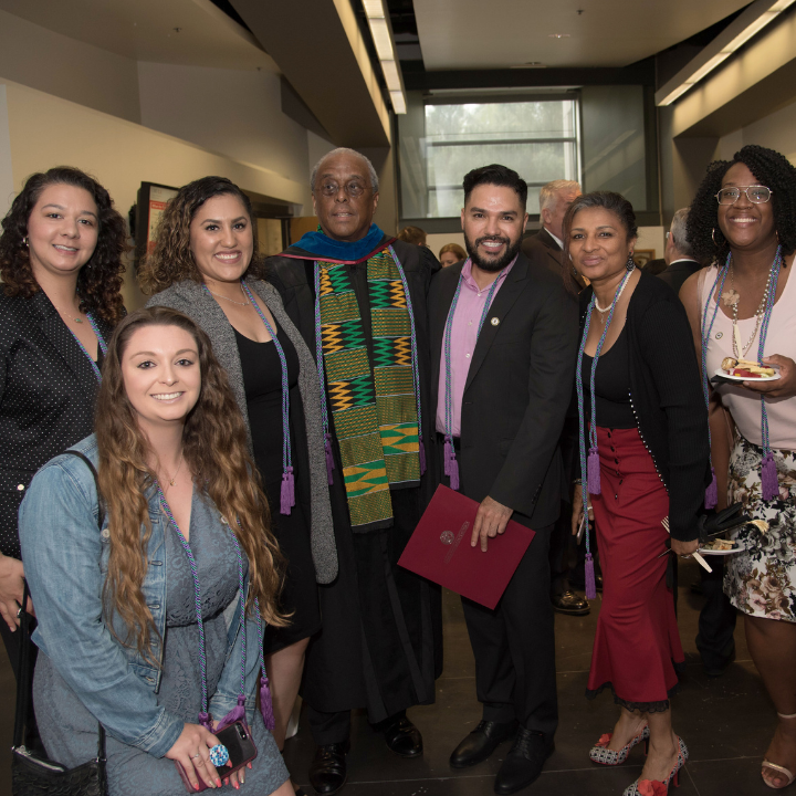 Professor Bill Parham at graduation with SOE students